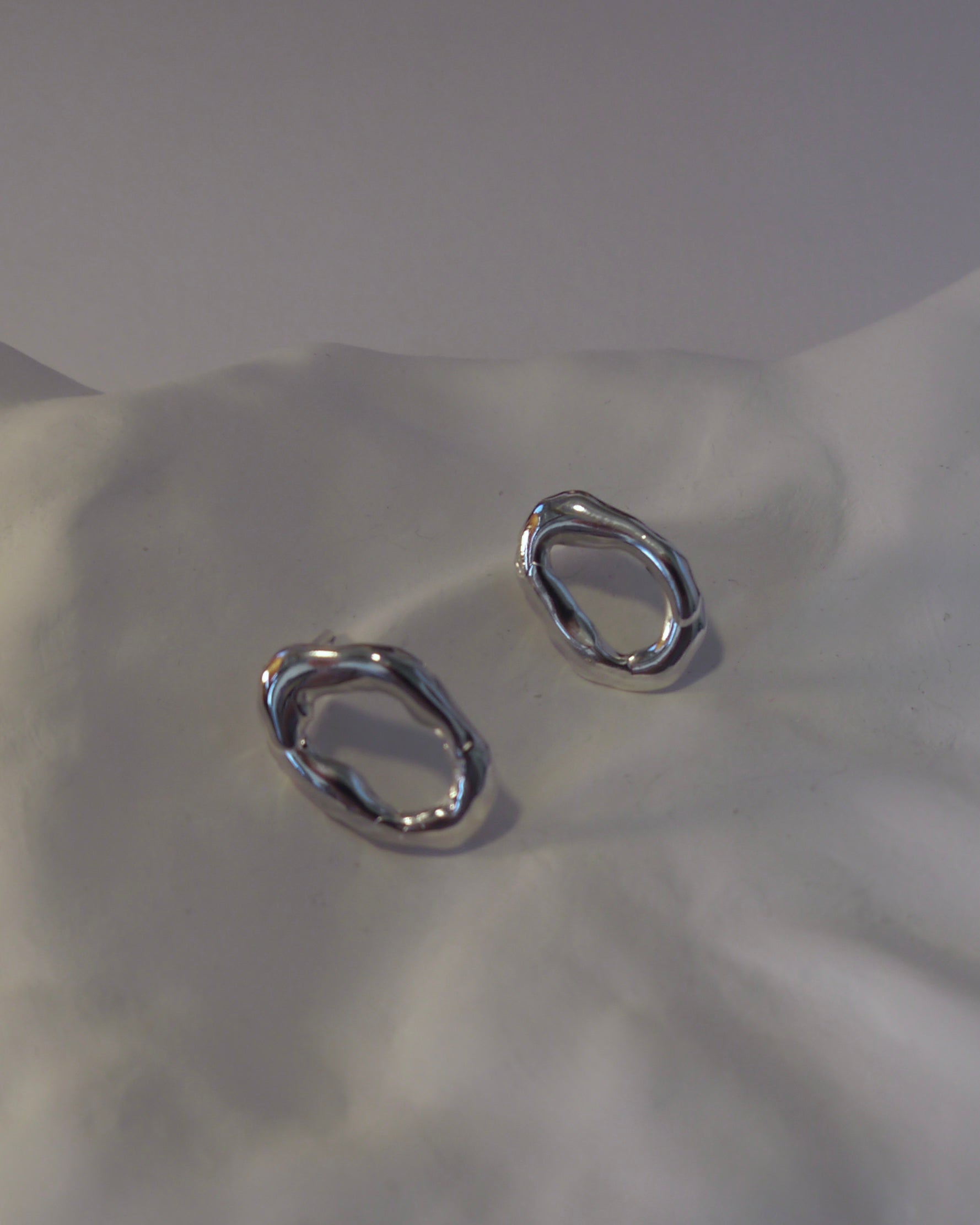 Toja - molten oval earring (with hook)